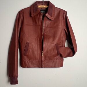 Y2K Women's Leather Bomber Jacket, rust coloured.